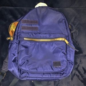 Herschel navy and gold backpack